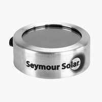 Seymour Solar Helios glass slip-on solar filters for telescopes fitting 3.75-inch to 5-inch optical tubes, tested to ISO 12312-2 transmission limits for safe solar viewing.